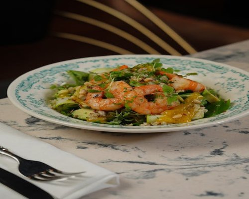 colorful salad bowl with greens